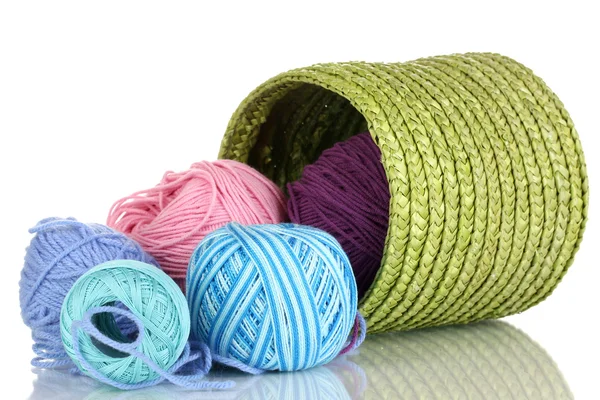 Colorful yarn for knitting in green basket isolated on white — Stock Photo, Image