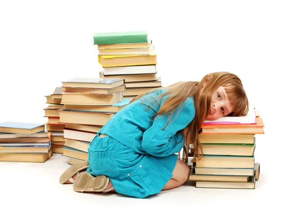 Bambina con un libro isolato su bianco — Foto Stock