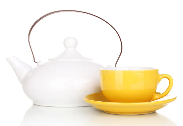 Yellow cup with saucer and teapot isolated on white — Stock Photo, Image