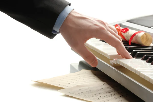 Hand of man playing piano — Stock Photo, Image