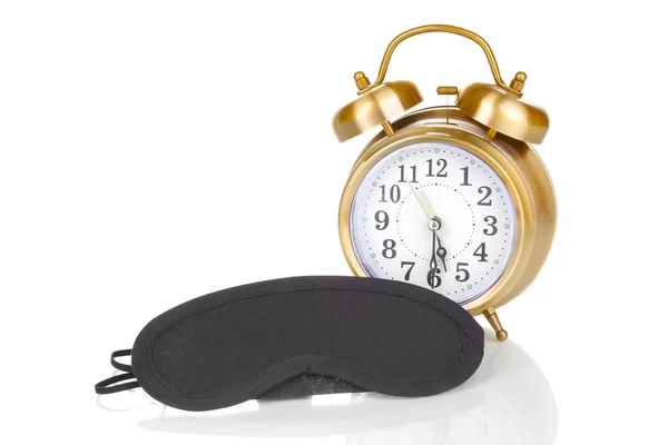 Sleeping mask and alarm clock isolated on white — Stock Photo, Image