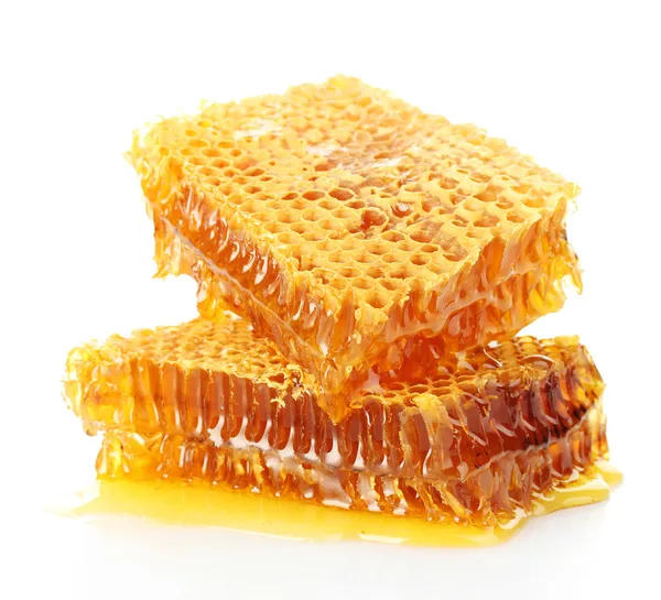 Rayons de miel doux au miel, isolés sur blanc — Photo
