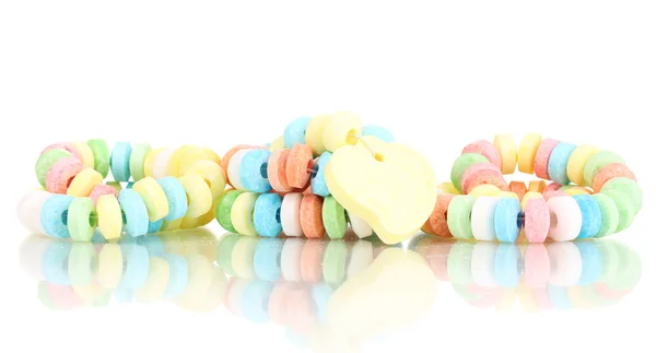 Barevné bonbóny na laně izolovaných na bílém — Stock fotografie