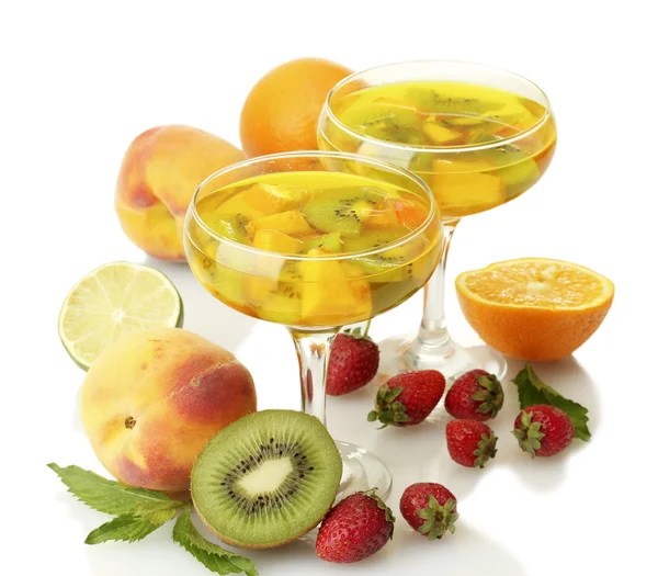 Punch in glasses with fruits, isolated on white — Stock Photo, Image