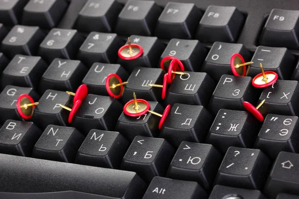 Painful typing, pins on keyboard close-up — Stock Photo, Image