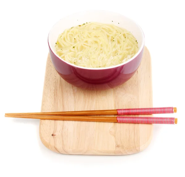 Asian noodles in bowl on wooden board isolated on white — Stock Photo, Image