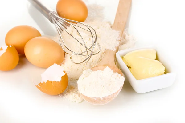 Yumurta, un ve tereyağı üzerine beyaz izole — Stok fotoğraf