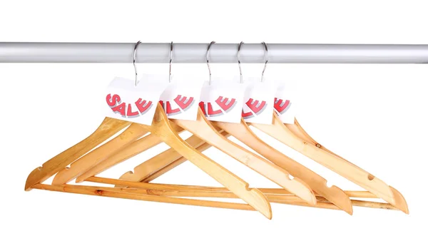 Kleiderbügel aus Holz als Verkaufssymbol isoliert auf weiß — Stockfoto