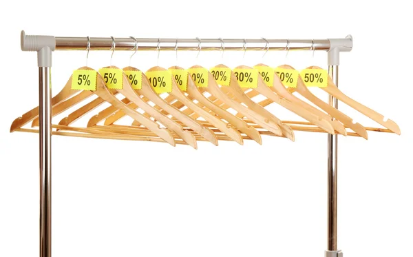 Wooden clothes hangers as sale symbol isolated on white — Stock Photo, Image