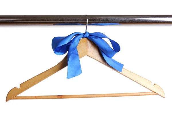 Beautiful blue bow hanging on wooden hanger isolated on white — Stock Photo, Image