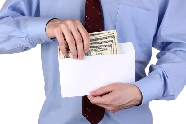 Man gets out of the envelope dollars on white background close-up — Stock Photo, Image