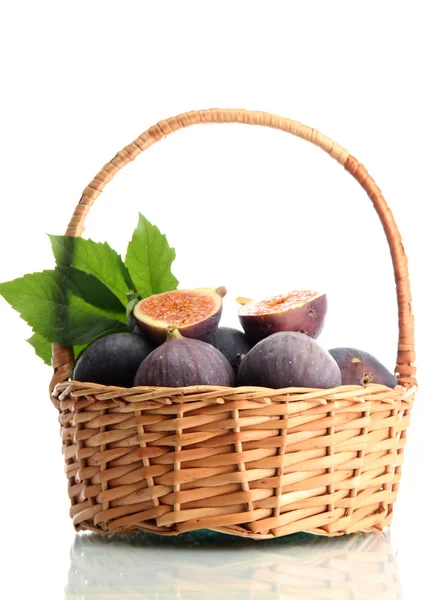 Ripe sweet figs with leaves in basket isolated on white — Stock Photo, Image