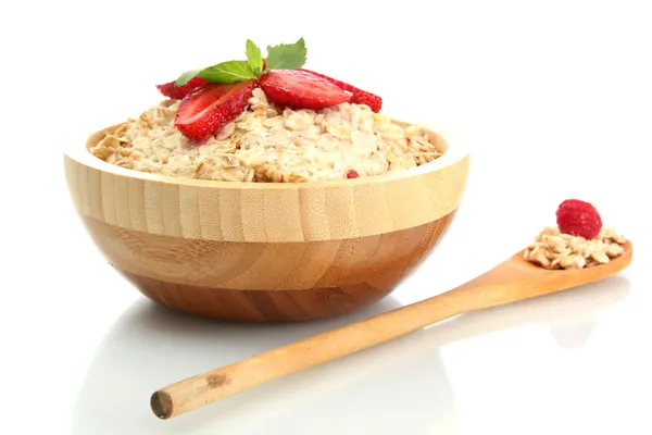 Tasty oatmeal with strawberries, isolated on white — Stock Photo, Image