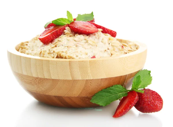 Tasty oatmeal with strawberries, isolated on white — Stock Photo, Image