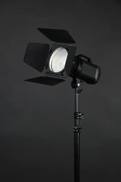 Studio lighting on black background close-up — Stock Photo, Image