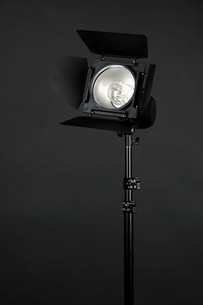 Studio lighting on black background close-up — Stock Photo, Image