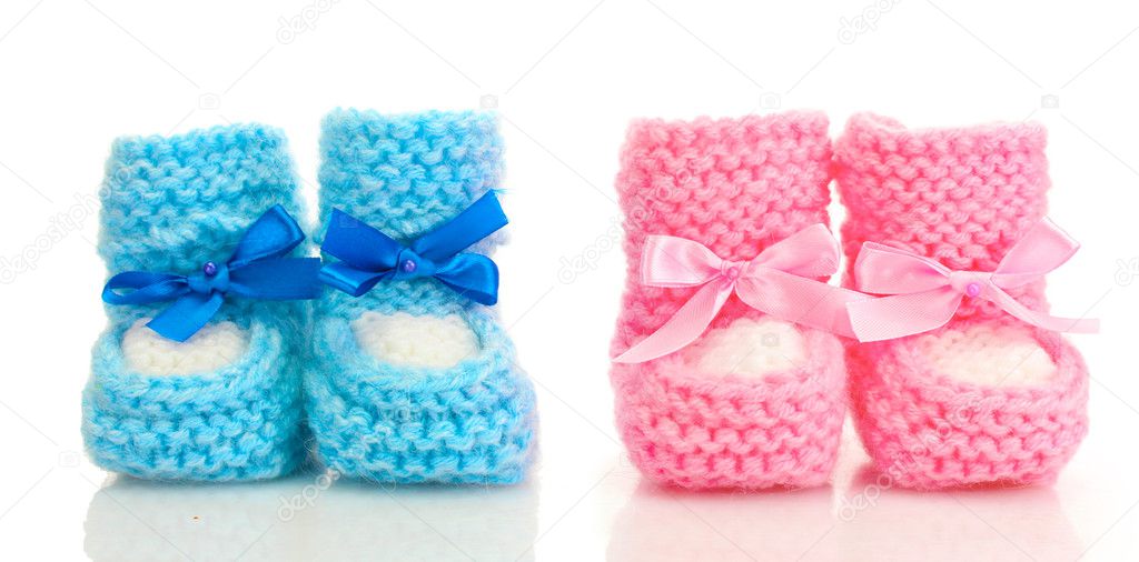 pink and blue baby boots isolated on white