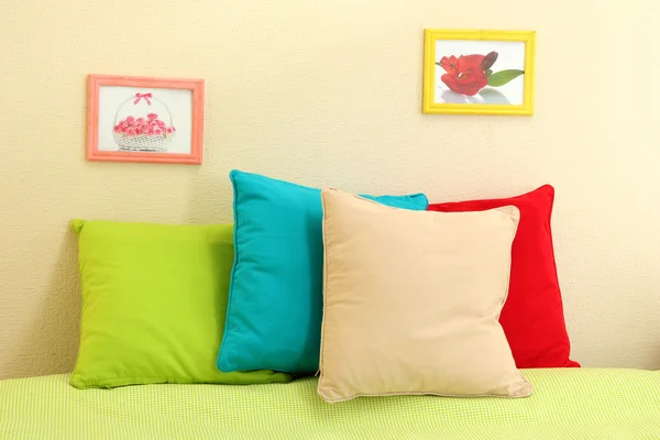 Empty bed with pillows and sheets in bedroom — Stock Photo, Image