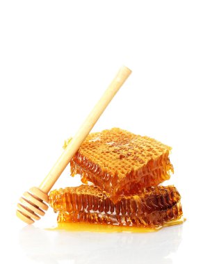 tatlı petek ve ahşap drizzler, üzerinde beyaz izole