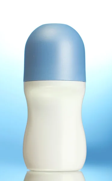 Deodorant på blå bakgrund — Stockfoto