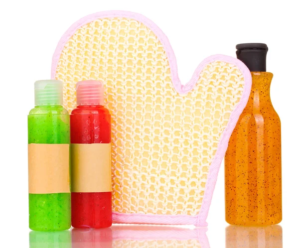 Bottles with scrub and sponge isolated on white — Stock Photo, Image