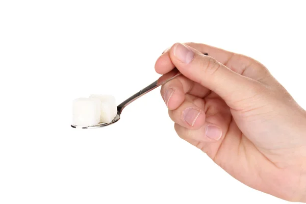 Azúcar blanco en cuchara metálica aislada sobre blanco — Foto de Stock