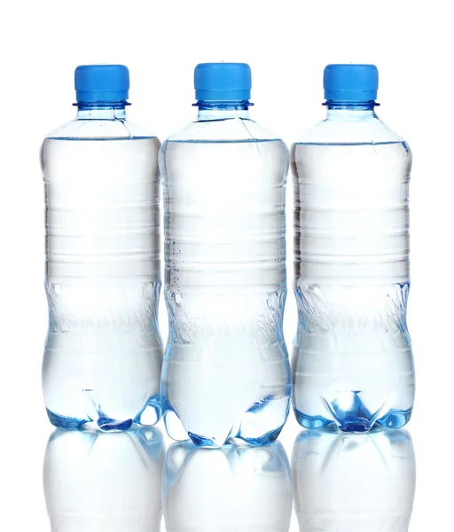 Plastic bottles of water isolated on white — Stockfoto