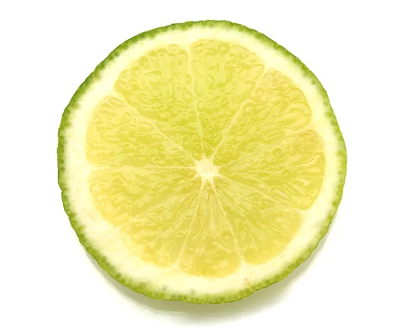 Slice of lime isolated on white — Stock Photo, Image