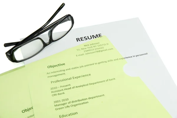 Resume in folder with glasses, isolated on white — Stock Photo, Image