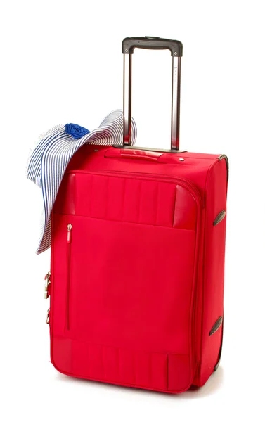 Red suitcase with woman's hat isolated on white — Stock Photo, Image