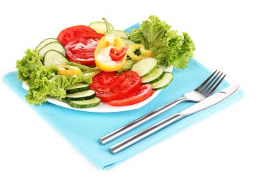 Chopped vegetables and sauce on plate isolated on white