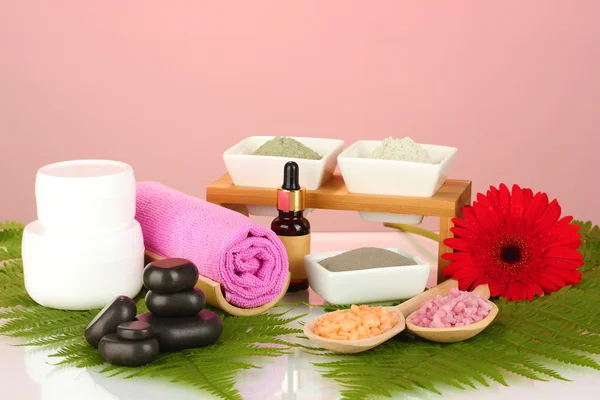 Cosmetic clay for spa treatments isolated on colorful background — Stock Photo, Image