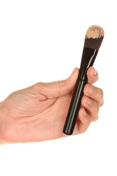 Woman applying concealer on hand on white background close-up — Stock Photo, Image