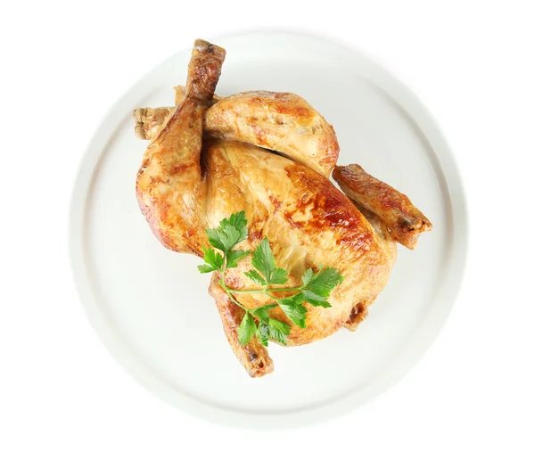 Pollo intero arrosto su un piatto bianco isolato su bianco — Foto Stock