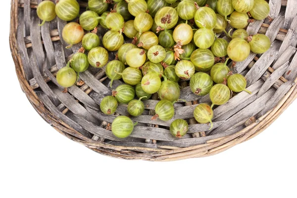 Green gooseberry on wicker mat isolated on white — Stock Photo, Image