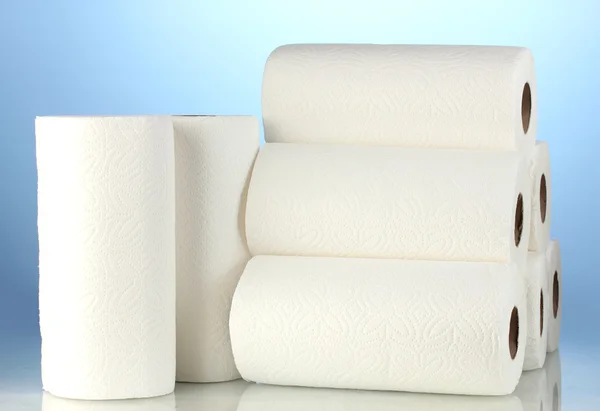 Rolls of toilet paper on blue background — Stock Photo, Image