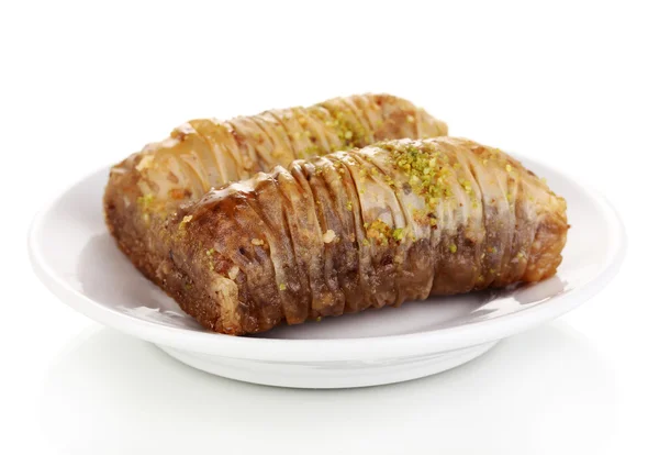 Sweet baklava on plate isolated on white — Stock Photo, Image