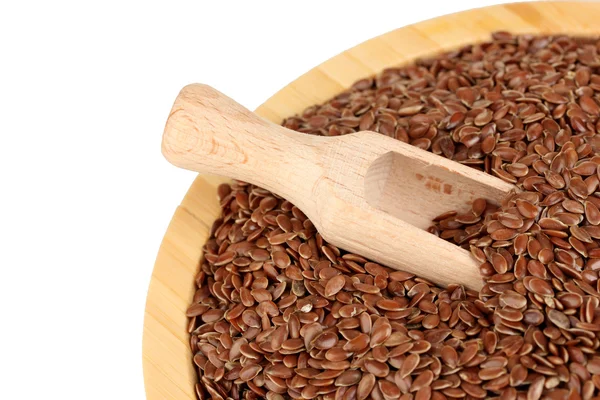 Flax seeds in wooden bowl with spoon on white background close-up — Stock Photo, Image