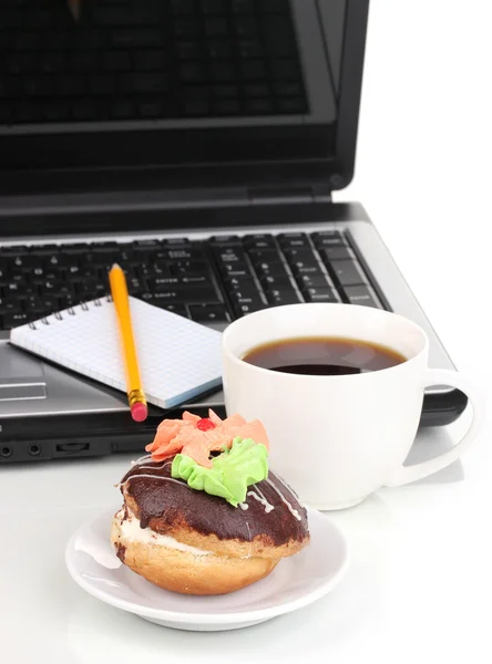 Eating at work place near laptop — Stock Photo, Image