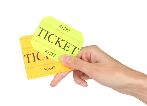 Рука женщины держит красочные билеты на белом фоне крупным планом — стоковое фото