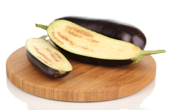 Fresh eggplant and halves on chopping board isolated on white — Stock Photo, Image