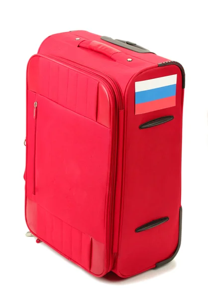 Red suitcase with sticker with flag of Russian Federation isolated on white — Stock Photo, Image