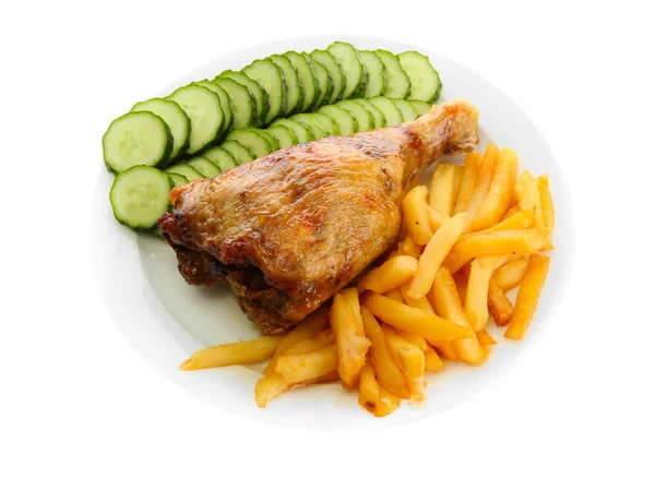 Roast chicken with french fries and cucumbers on plate, isolated on white — Stock Photo, Image