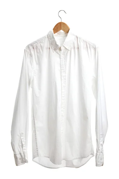 Camisa en percha de madera aislada en blanco —  Fotos de Stock