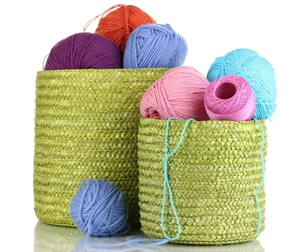 Colorful yarn for knitting in green basket isolated on white — Stock Photo, Image