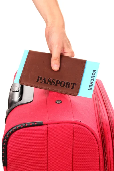 Holding passport and suitcase in hand close-up — Stock Photo, Image