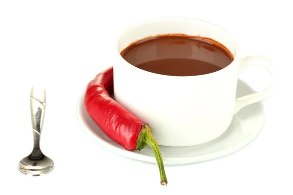 White cup with hot chocolate and chili pepper isolated on white Royalty Free Stock Images