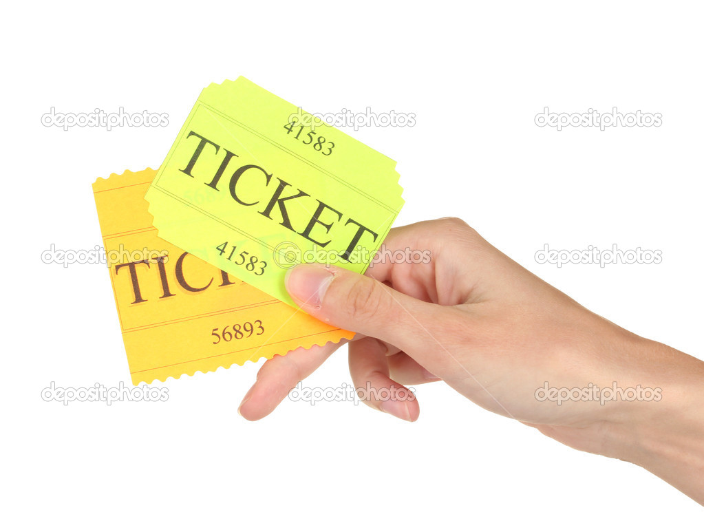 Woman's hand holding a colorful tickets on white background close-up