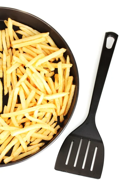 Potatis frites i pannan på vit bakgrund närbild — Stockfoto