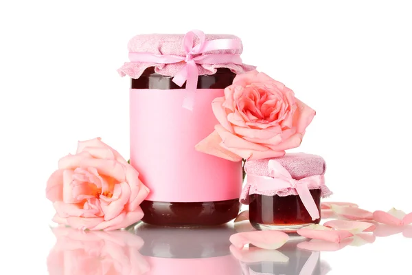 Jars with rose jam and flowers isolated on white — Stock Photo, Image